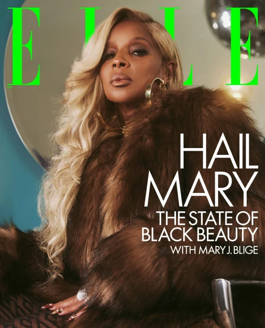 Mary J. Blige on the cover of Elle magazine wearing a brown fur coat, gold jewelry, and blonde wavy hair in a studio setting.