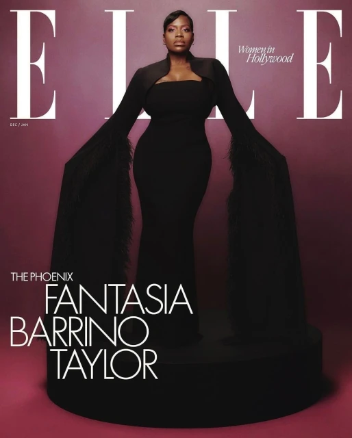 Fantasia Barrino Taylor in black gown on Elle magazine cover, standing on platform in photo studio with pink background.