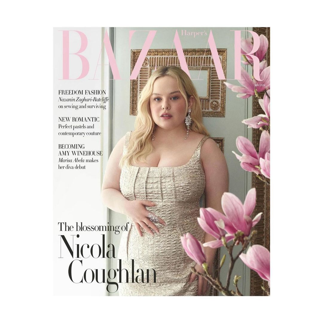 Nicola Coughlan on Harper's Bazaar magazine cover; she is wearing a gold dress next to pink magnolia flowers and a doorway.