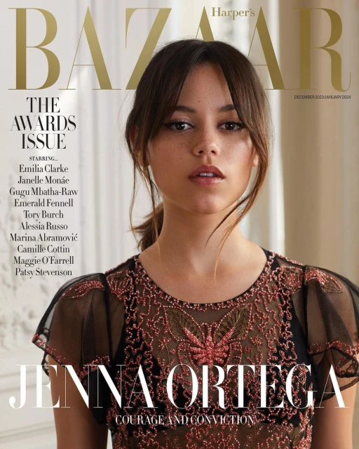 Jenna Ortega poses on the cover of Harper's Bazaar's The Awards Issue, wearing a sheer black dress with coral embellishments, smiling slightly.