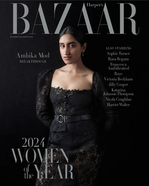 Harper's Bazaar magazine cover featuring Ambika Mod in a lace dress, against a dark background, promoting the 2024 Women of the Year issue.