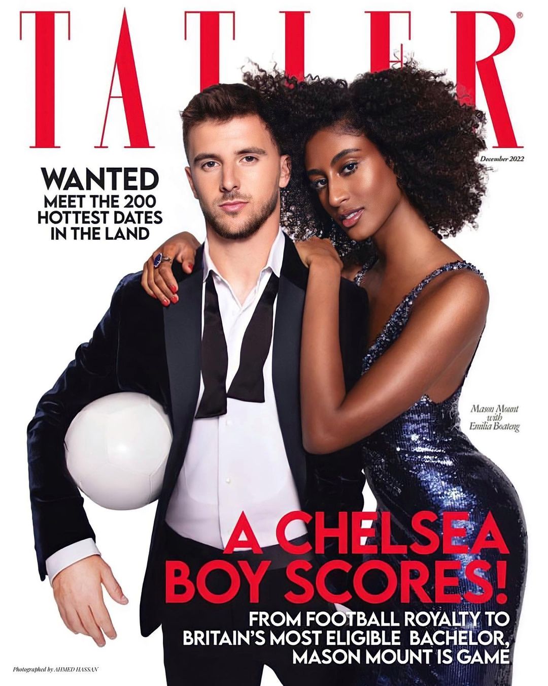 Tatler cover featuring a male football player in a tuxedo holding a ball, alongside a Black female model in a shimmering gown.