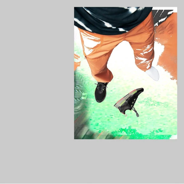 Person wearing orange pants, black and white shirt, and black sneakers floating in the air, with a green and white patterned background.
