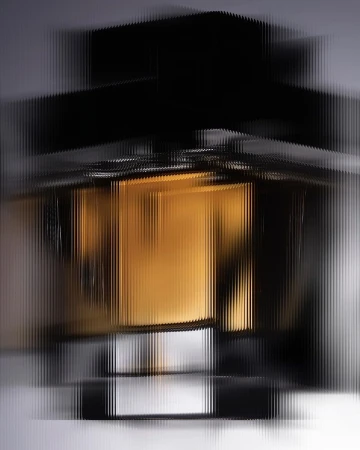 Distorted studio shot of a perfume bottle seen through rippled ribbed glass creating vertical linear distortion