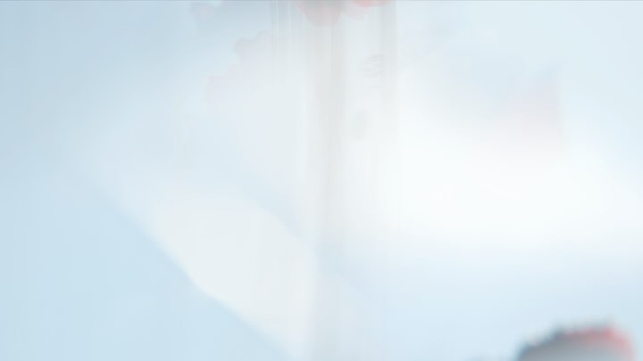 Abstract watercolor background featuring gradients of light blue and white, creating a serene and minimalist visual texture.