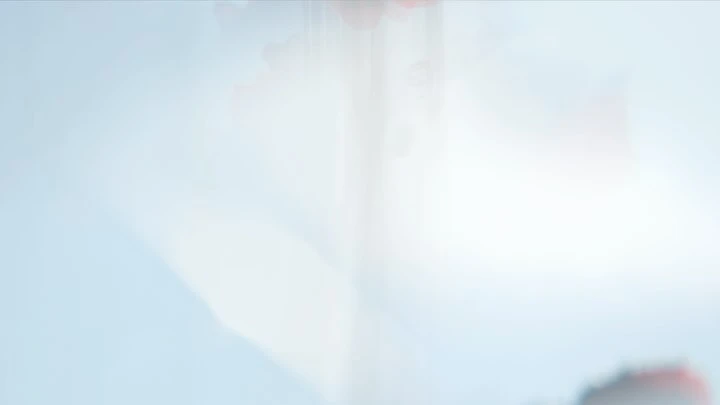 Abstract watercolor background featuring gradients of light blue and white, creating a serene and minimalist visual texture.