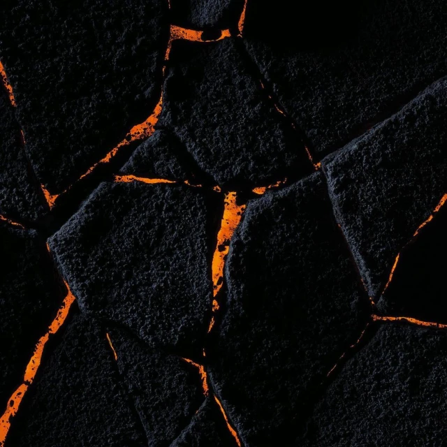 Abstract image of black cracked surface with bright orange glowing fissures, creating a stark contrast between darkness and light.