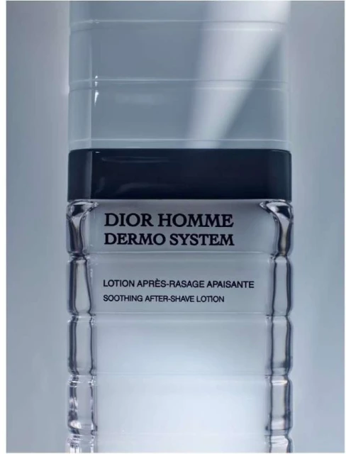 Product shot of Dior Homme Dermo System lotion bottle, featuring sleek packaging and monochromatic color scheme against soft lighting.