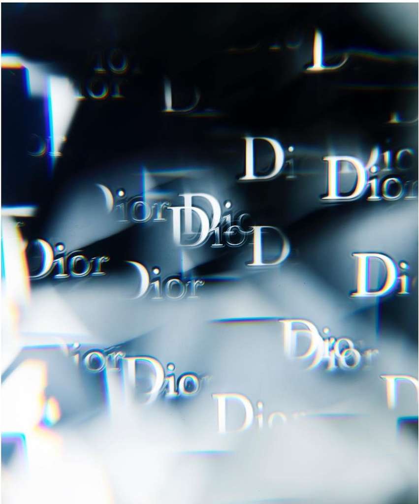 Abstract view of repeated Dior logos in a blurred, cool-toned image with a high-fashion feel and modern design aesthetic.