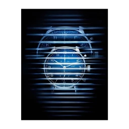 Close-up of a blue dial chronograph watch behind horizontal light streaks against a dark background.