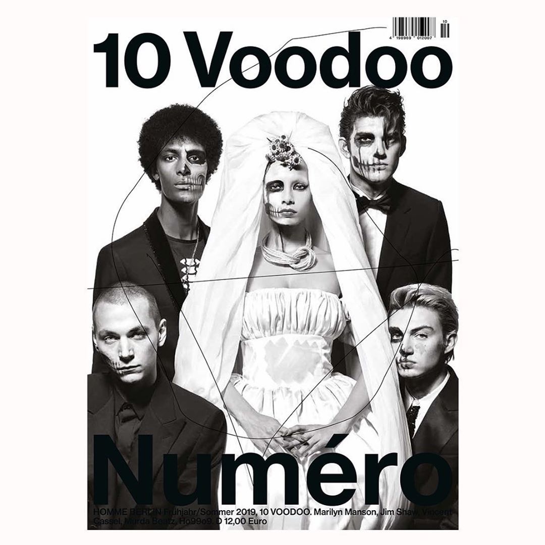 Magazine cover featuring a group of models with stylized makeup and formal attire. The cover includes the text "10 Voodoo" and "Numero".