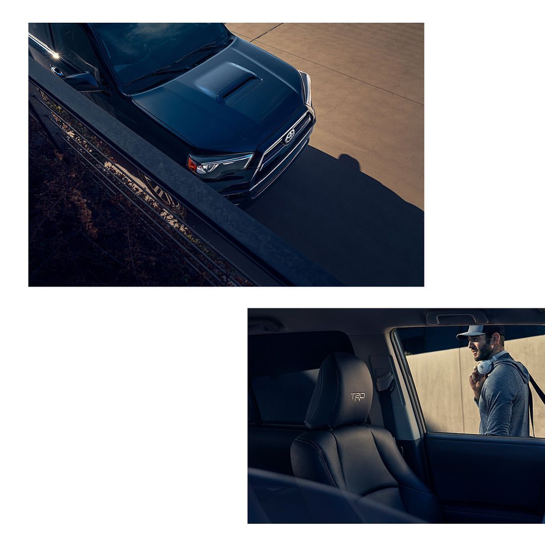Front of a dark blue Toyota 4Runner SUV parked on a concrete surface, complemented by a view of the car's interior with a man near it.