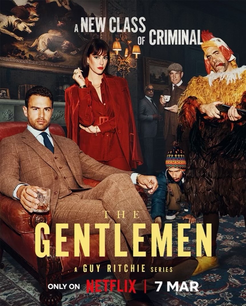 Promotional poster for 'The Gentlemen' series features cast members in costume. Man in brown suit seated. Netflix logo visible.