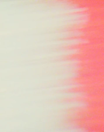 Blurred abstract background with blended shades of cream and coral creating a soft, dreamy effect, suitable for backgrounds.