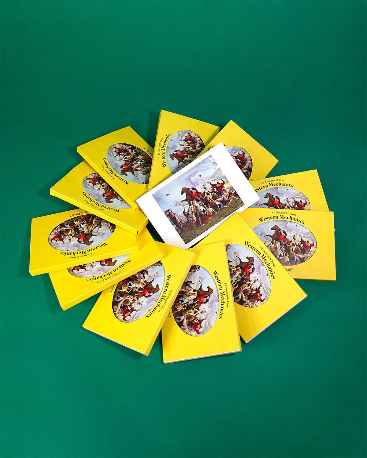 Stack of vintage yellow book covers featuring an illustration of cowboys riding horses, arranged against a green background.