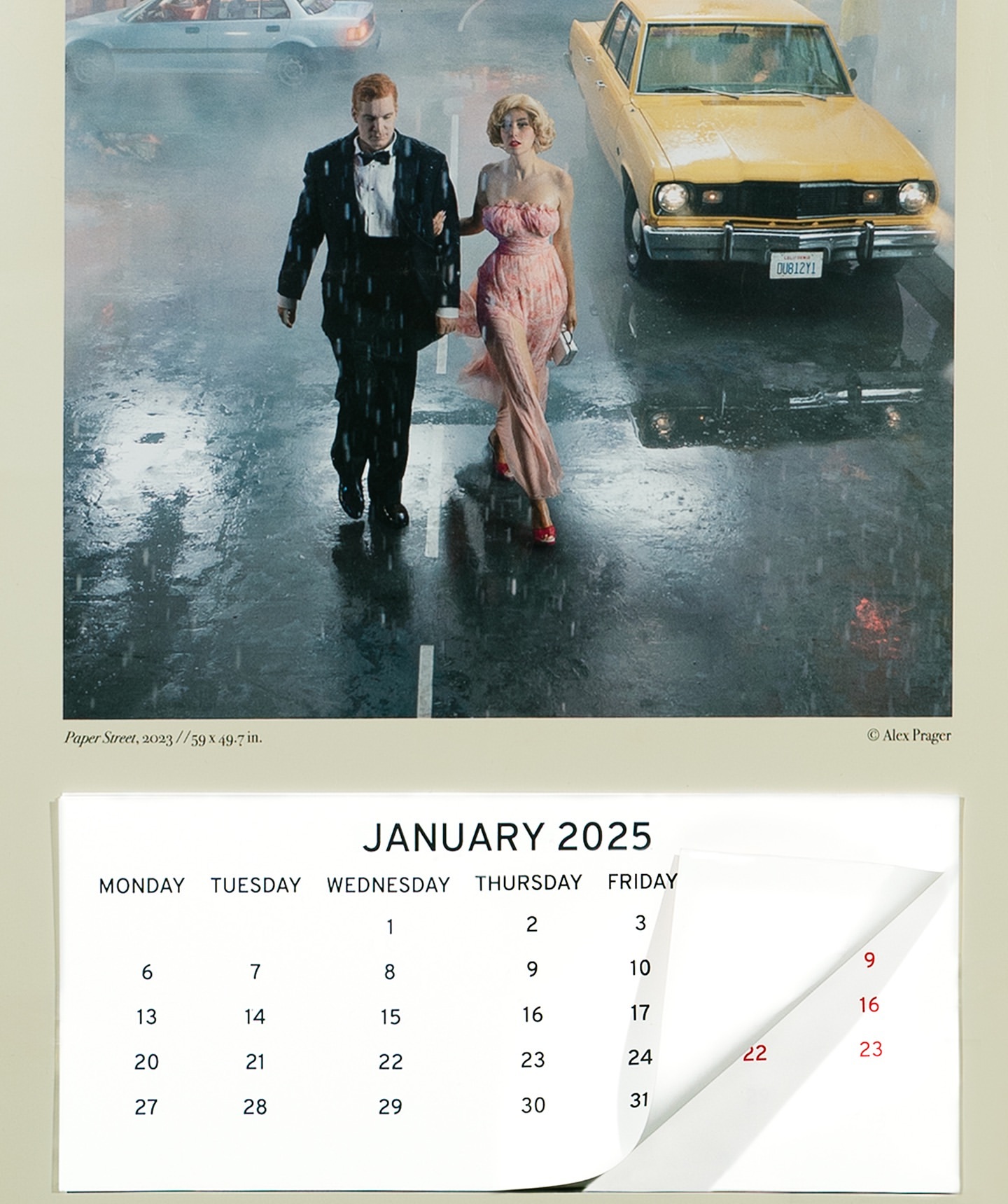 A couple in formal wear walk down a wet city street with a yellow car; an image from a 2025 calendar featuring photography by Alex Prager.