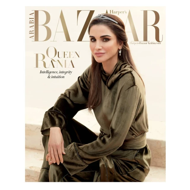 Magazine cover featuring Queen Rania in a velvet outfit, seated on stone steps, with the 'Harper's Bazaar Arabia' masthead.