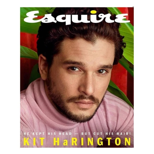 Magazine cover featuring Kit Harington in a pink turtleneck, with 'Esquire' logo and tropical foliage background, creating a vibrant portrait.