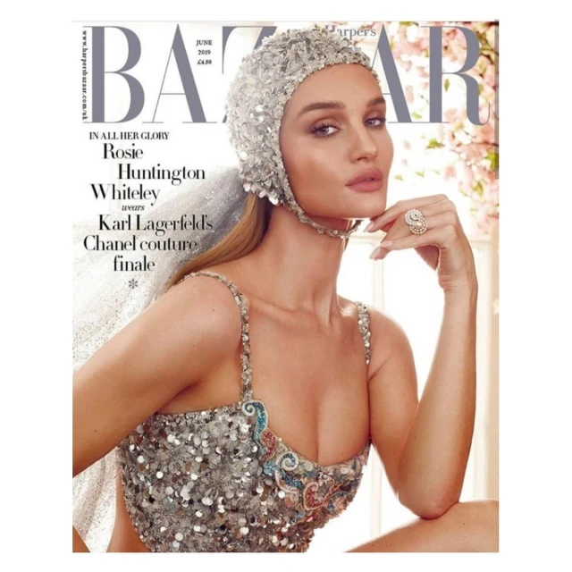 Rosie Huntington-Whiteley magazine cover, June 2019 Harper's Bazaar, wearing a sequined cap and dress with an ornate ring.
