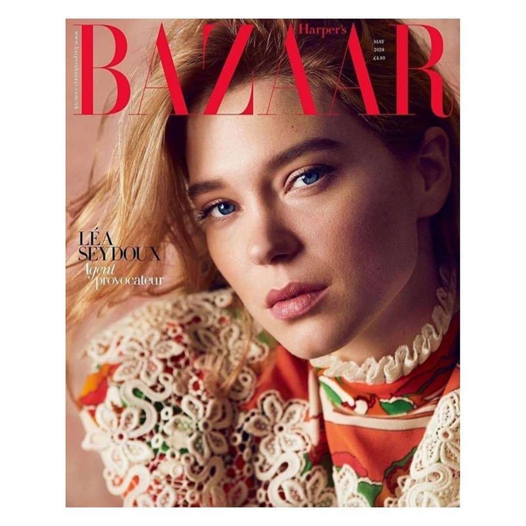 Magazine cover featuring Léa Seydoux in a close-up shot, wearing a floral-patterned top with lace details and the 'Harper's Bazaar' logo.