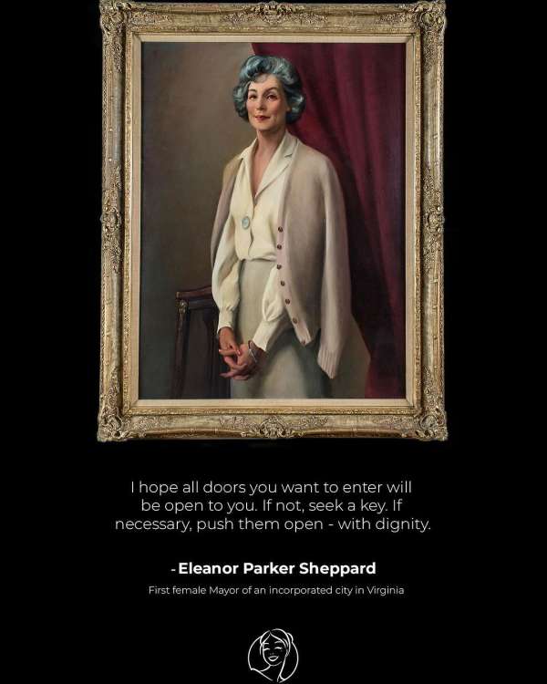 Framed oil portrait of an elderly woman with blue-grey hair wearing a beige cardigan and blouse against a dark background