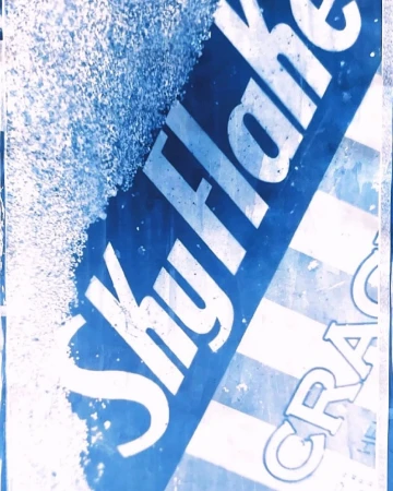 Close-up abstract photograph featuring blue and white typography and distressed textures by photographer Alice Rosati