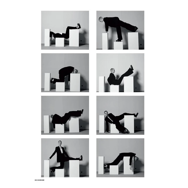 Black and white fashion shot shows woman in black suit posing in eight poses atop white cubic blocks against a plain light gray backdrop.