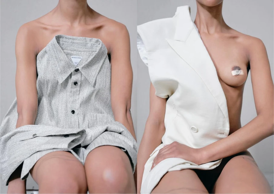 Two women in a photo studio. One model wears an oversized button-down shirt; the other wears an oversized blazer in a fashion shoot.