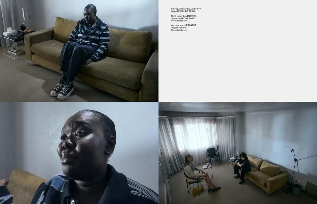 An adult sits on a couch in a sparsely decorated interior, shot with subdued lighting in a melancholic fashion editorial style.