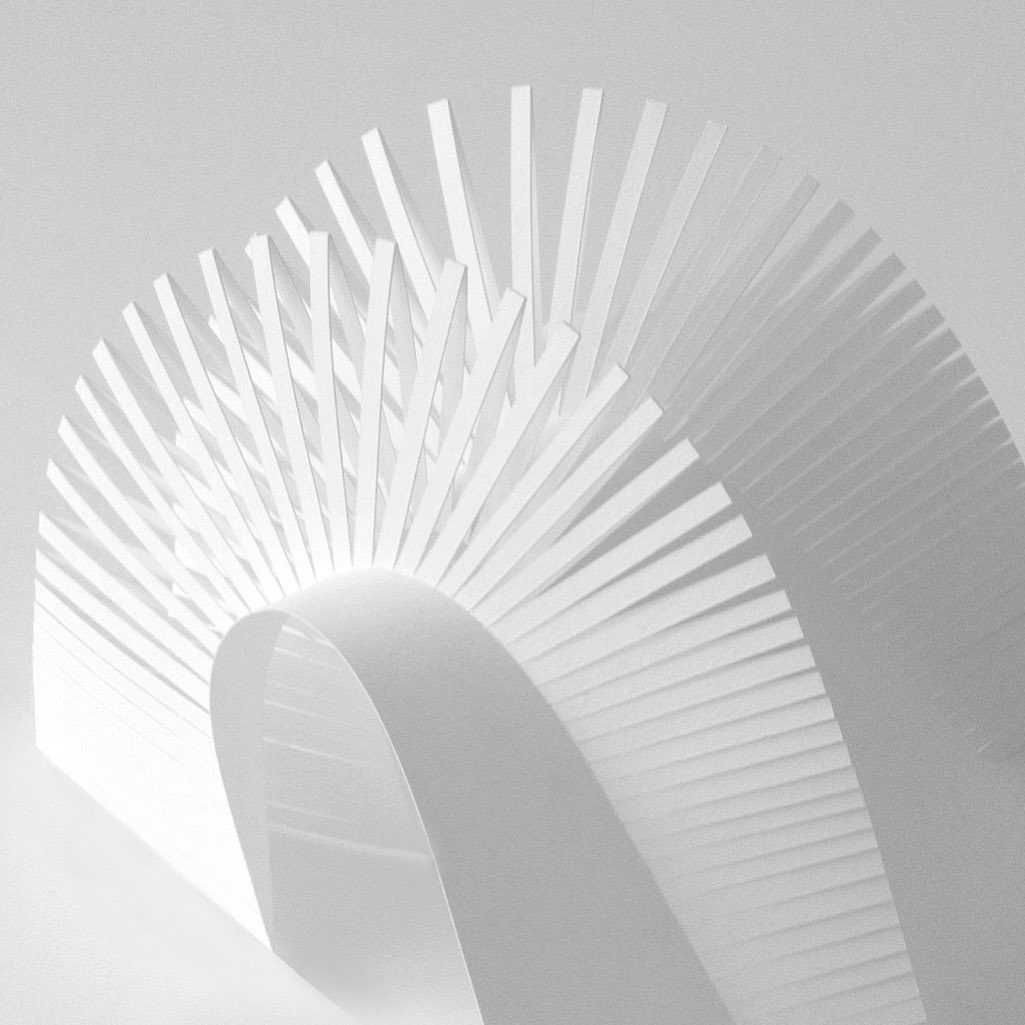 Abstract monochrome image of intricately arranged white paper strips forming a geometric pattern, showcasing minimalist paper art design.