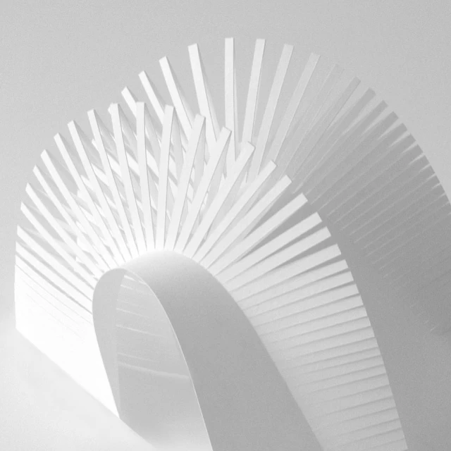 Abstract monochrome image of intricately arranged white paper strips forming a geometric pattern, showcasing minimalist paper art design.