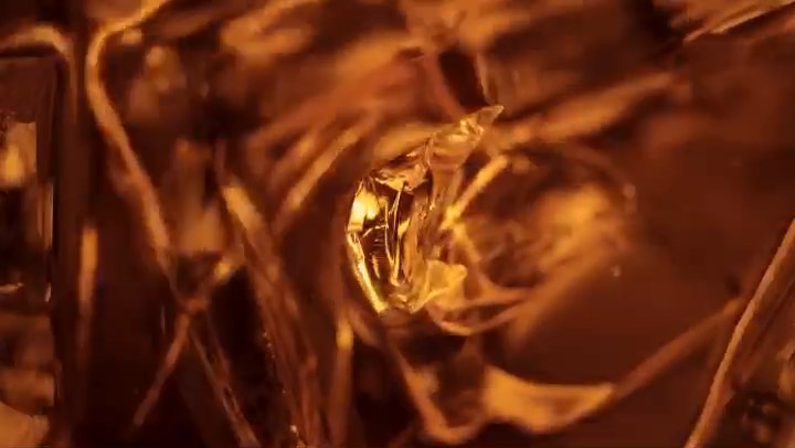 Abstract close-up of golden metallic folds, creating a dynamic and luxurious background texture with reflective highlights.