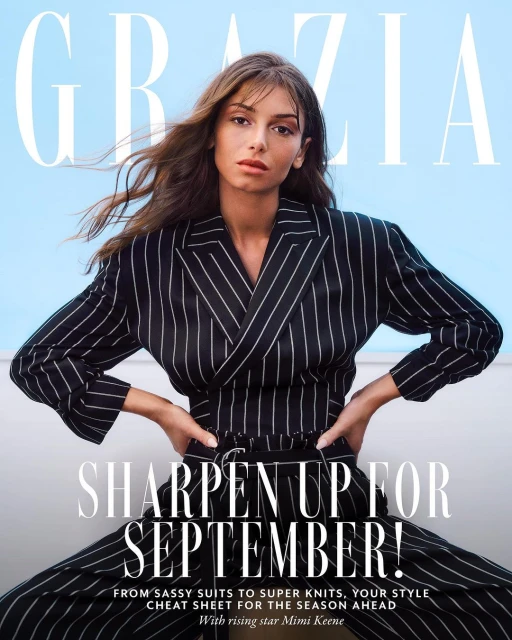 Fashion magazine cover featuring a woman in a striped suit against a light blue background. 'Grazia' and 'September' are the dominant cover text.