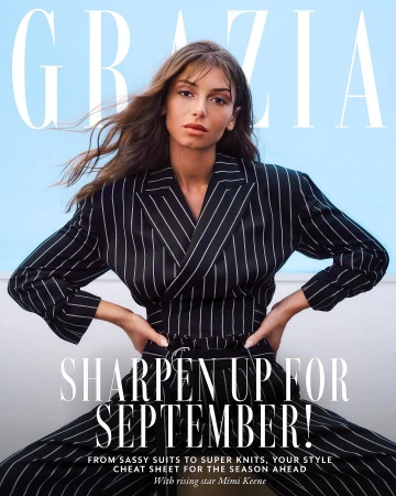 Fashion magazine cover featuring a woman in a striped suit against a light blue background. 'Grazia' and 'September' are the dominant cover text.