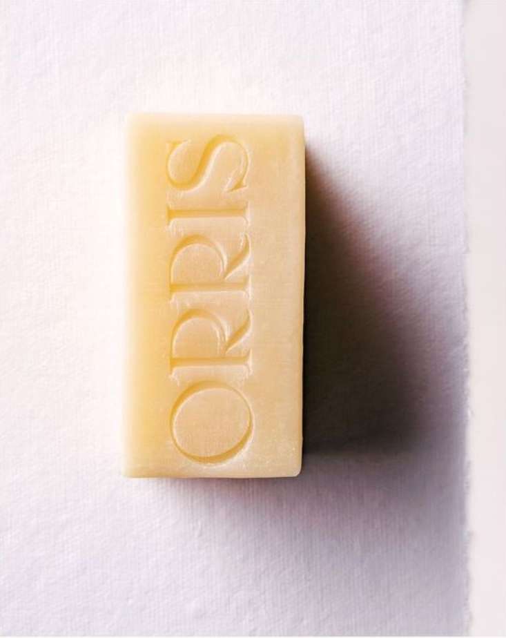 Rectangular bar of Orris soap against white backdrop. The soap is off-white with the brand name embossed on its surface.
