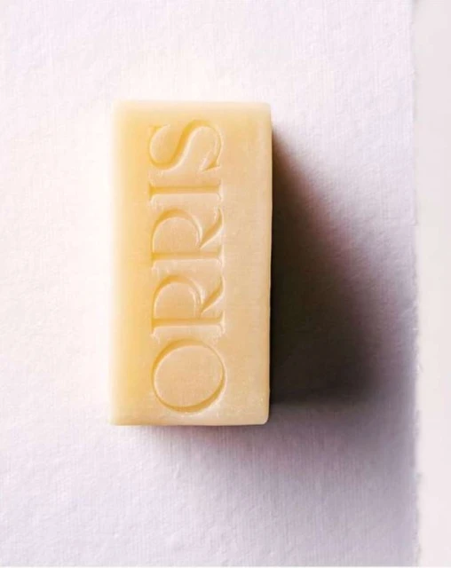 Rectangular bar of Orris soap against white backdrop. The soap is off-white with the brand name embossed on its surface.