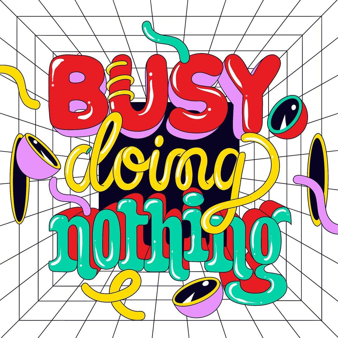 Colorful illustration with the words 'busy doing nothing' in stylized typography, set against a grid background with abstract shapes.