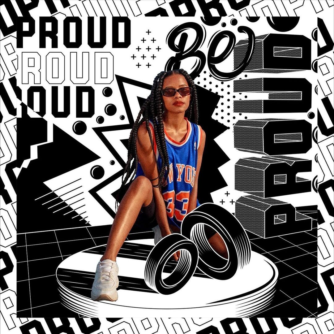 Stylish woman in jersey poses on a round platform with tires, set against a bold black and white patterned background.