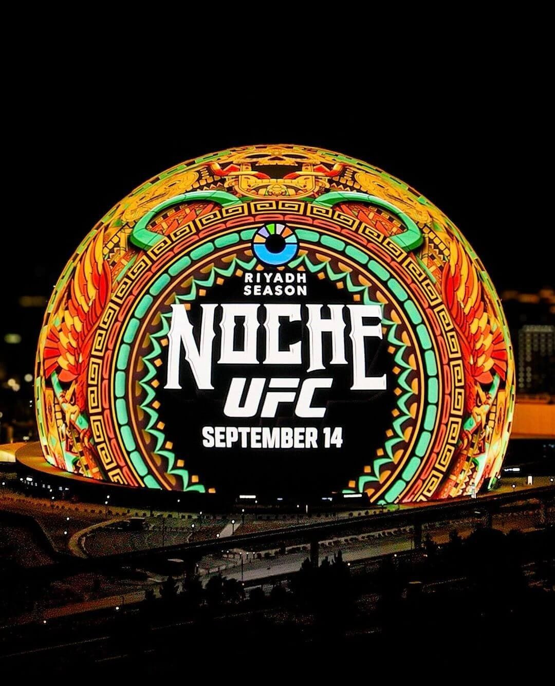 Illuminated dome with intricate patterns and text announces the Noche UFC event in Riyadh, Saudi Arabia, for September 14th.