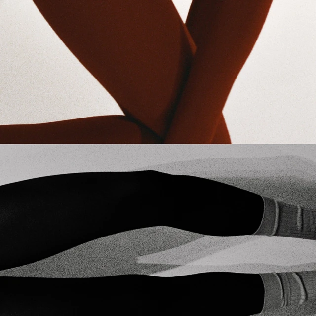 Abstract split-screen image of a model's legs in opaque tights against a bright white background, with a black and white section below.