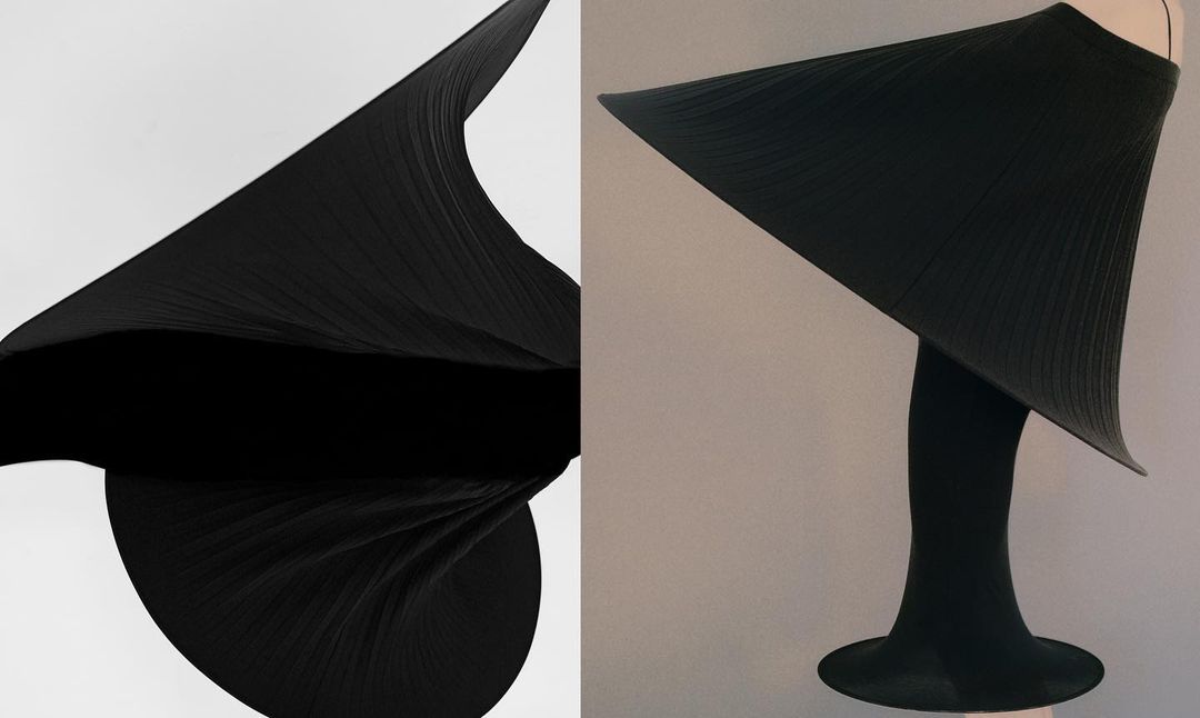 Striking studio shot of dramatically draped black textile, one image features billowing fabric and the other a sculpture.