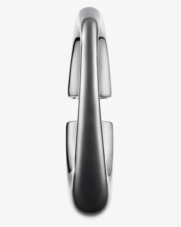 Close-up studio shot of a sleek, modern metal water faucet with a curved spout and reflective surface, set against a plain white background.