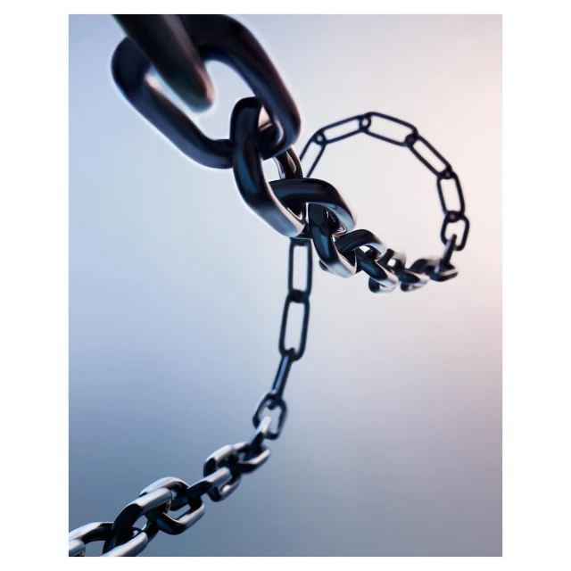 Abstract macro photograph of a curved, interlinked metal chain against a gradient blue and white background. Conceptual, strength, security theme.