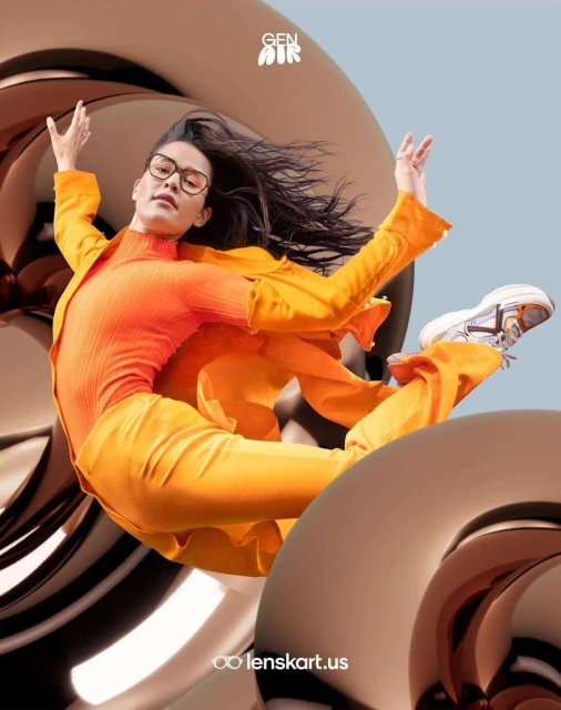Eye-wear advertisement featuring a young adult female model with glasses in a dynamic pose, wearing an orange outfit and sneakers.