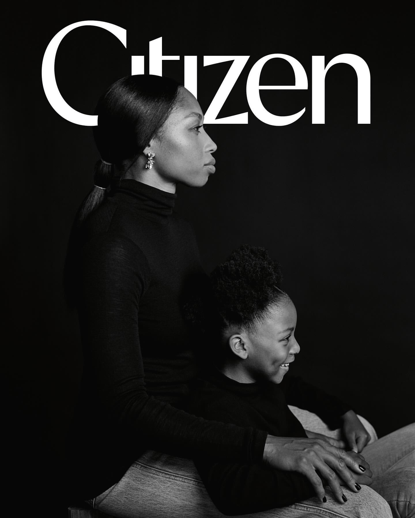 A mother and child portrait in black and white, with the 'Citizen' logo above them, showcasing an intimate and elegant composition.