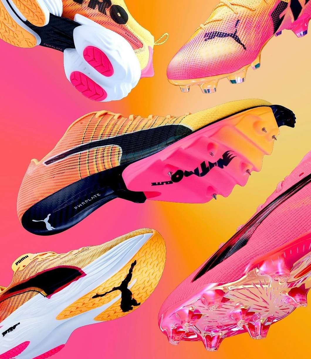 Dynamic studio shot showcases several Puma soccer shoes in bright shades of orange, pink, and yellow, presented against a vivid gradient backdrop.