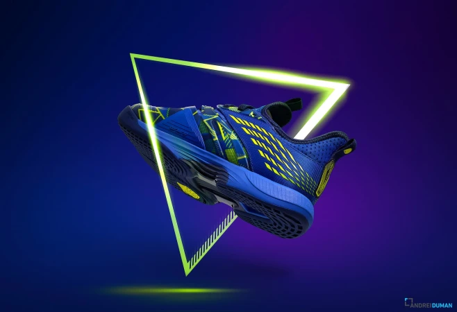 Dynamic studio shot of a blue athletic shoe with yellow accents, levitating against a vibrant purple and blue gradient backdrop and neon triangle.