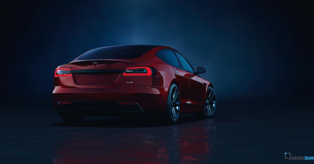 Rear view of a sleek red Tesla car with modern taillights and alloy wheels, parked in a dark studio with reflective flooring.