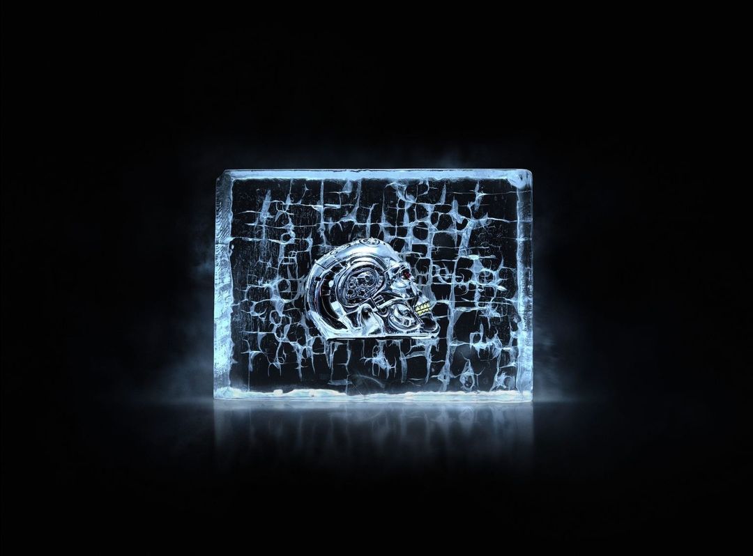 Shiny chrome skull inside cracked ice block on reflective black surface, creating a dark and edgy digital art piece.