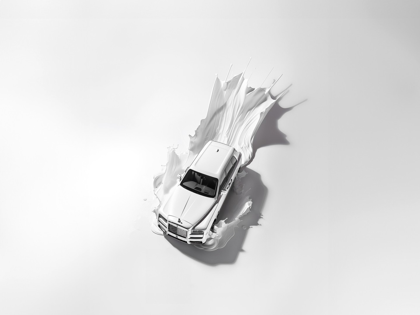 Elevated shot of a white Rolls Royce car partially submerged in a splash of white paint against a bright white background.